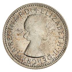 Round silver coin.