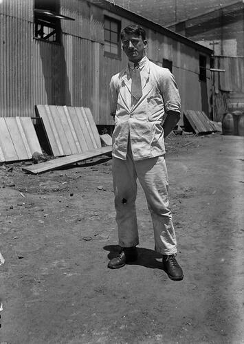 Man Behind Warehouse, circa 1910s