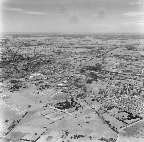 Monochrome aerial photograph of Noble Park and Dandenong.