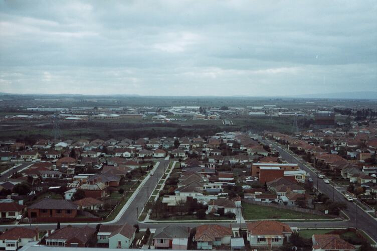 Oblique aerial view of suburbs.