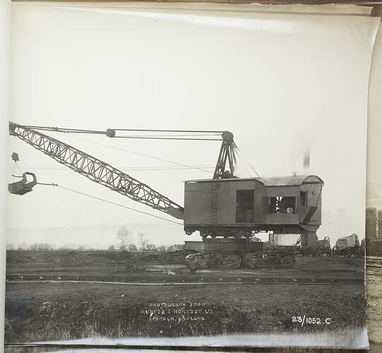 Monochrome photograph of a dragline excavator.