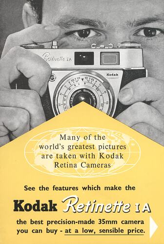 Printed text and photograph of man using camera.