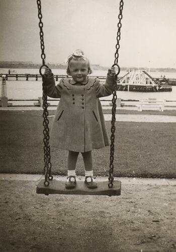 Susan Leech Standing on Swing, Frankston, circa 1954