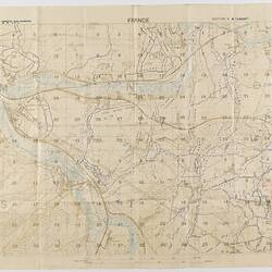 Map, printed in blue and brown ink on off-white cloth-backed paper. Degrees along axes.