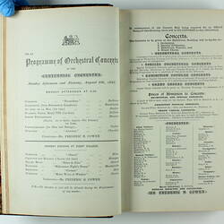 Open book with white pages and black printed text on both sides. Page 11.
