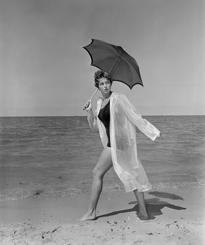 Model with Plastic Raincoat and Umbrella, Victoria, Feb 1959
