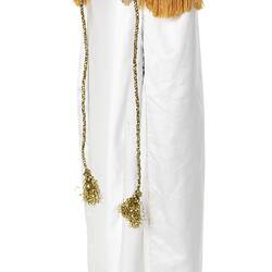 White costume cloak with gold and coloured detailed top section. Angle.