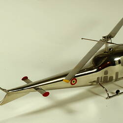 Chrome plated helicopter model. Rear side view.