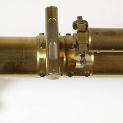 Brass scientific instrument with glass level, detail of level.