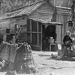 Negative - Two Children Sitting on a Barrel Outside a Roadmenders Hut, Mount Buffalo, Victoria, 1910