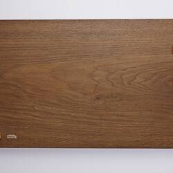 Back of rectangular wooden album cover.