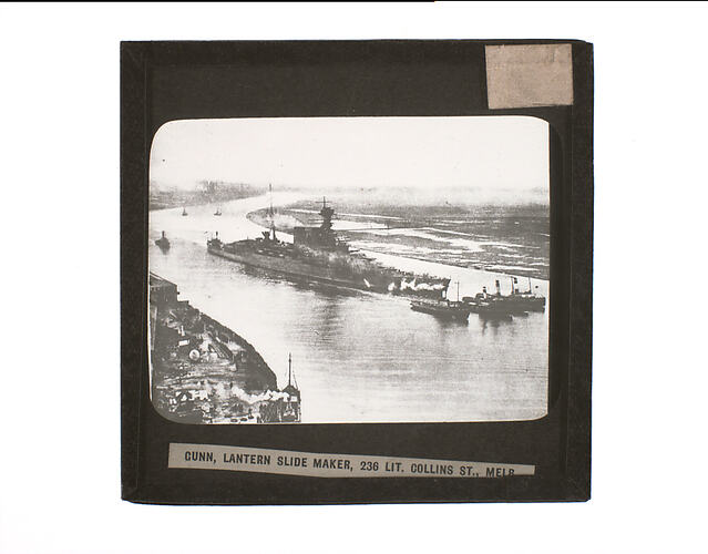 Lantern Slide - 4 Tugs Leading a War Ship into Port