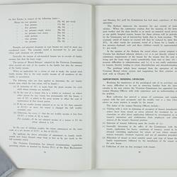 Open booklet with white pages and black printing.