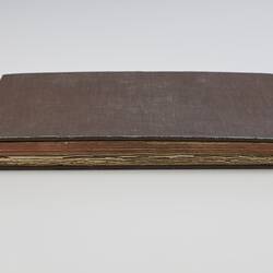 Brown cloth bound book.