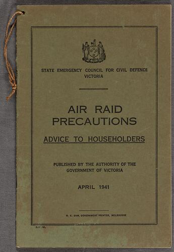 Front green cover of pamphlet. Black printed text.