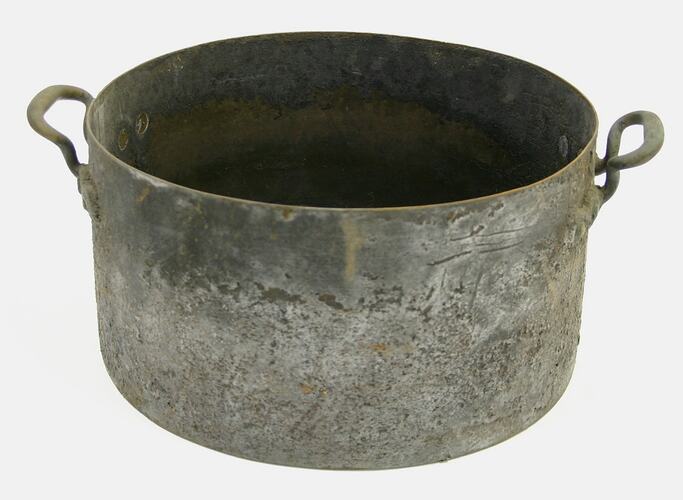 Side view of copper pot.