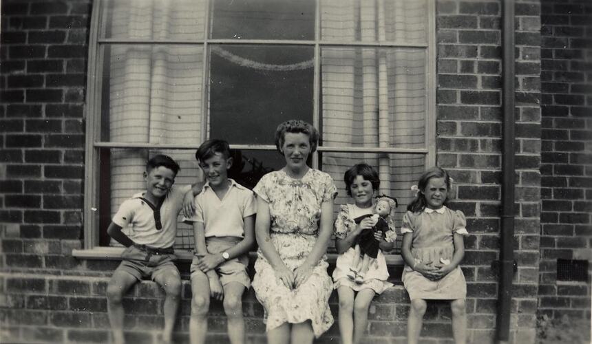 Digital Photograph - Woman, Two Boys & Two Girls on Window Sill of New Housing Commission House, West Heidelberg, 1950