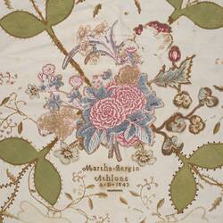 Applique quilt, with floral and bird pattern.