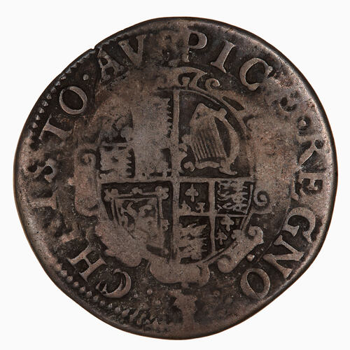 Coin, round, oval shield quartered with the arms of England, France, Scotland and Ireland.