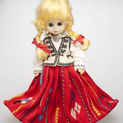 Doll wearing Latvian national dress