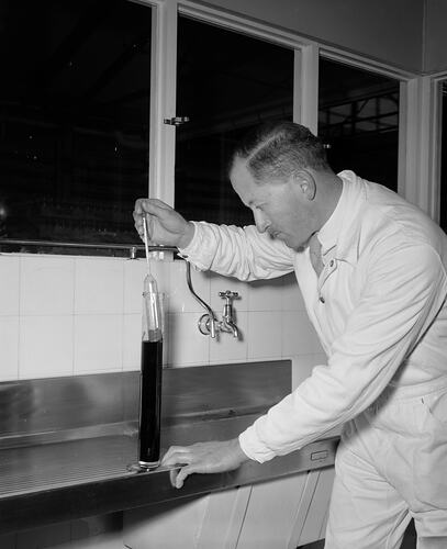 Coca-Cola, Worker Testing Product at Factory, Moorabbin, Victoria, Aug 1954