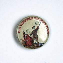 Badge with soldier holding flag, raising gun.