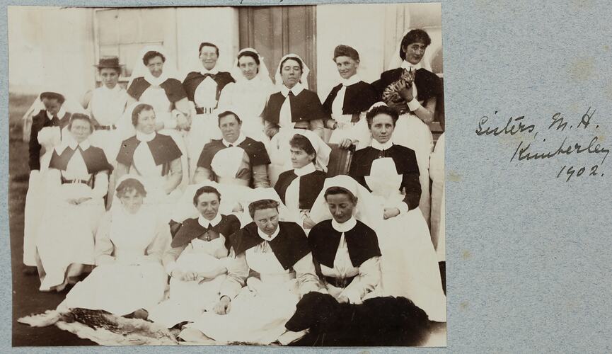 Group portrait of woman in nursing uniforms.