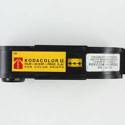 Plastic film cartridge with 'Kodacolor' sticker.