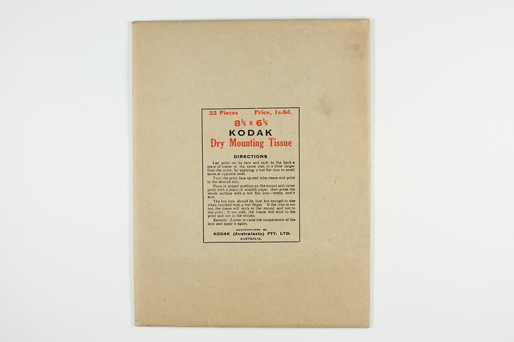 Brown paper packet with printed text in centre.