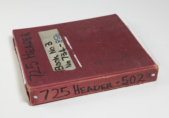 Photograph Album of harvesting equipment.