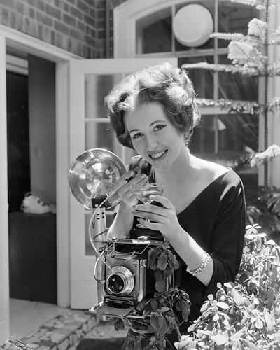 Woman with a Camera, South Yarra, Victoria, 16 Nov 1959