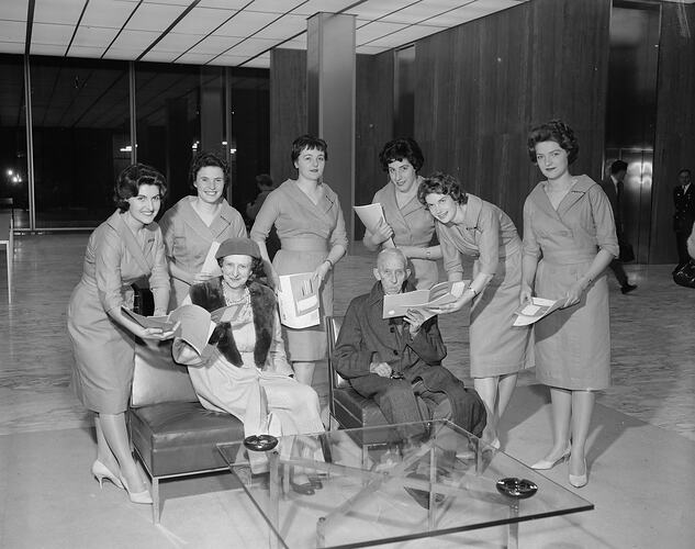 Shell Co, Hostesses Surrounding a Couple, Melbourne, 04 Oct 1960