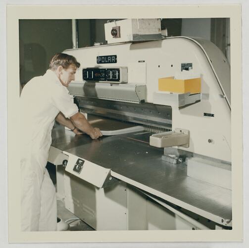 Worker Feeding Paper Into Guillotine, Kodak Factory, Coburg, circa 1960s