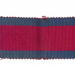 Ribbon with three stripes of red and blue.