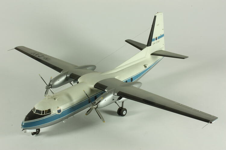 Blue and white model of a two -engined aeroplane.