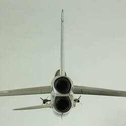 Silver model aeroplane. Back view.