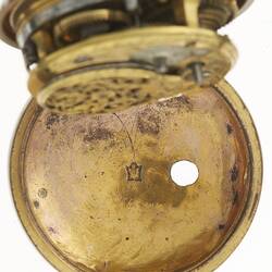 Pocket watch case, open showing stamp.