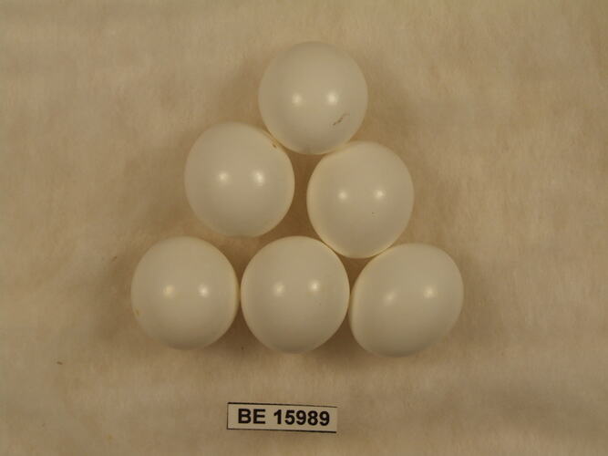 Six bird eggs with specimen label.