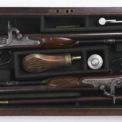 Pair of pistols in wooden case.