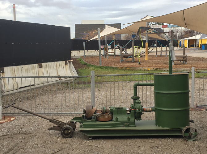 Side view of pump mounted on trolley frame.