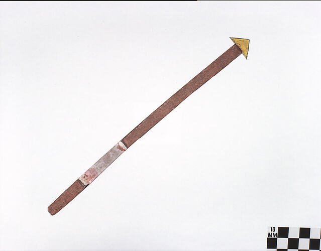 Puppet spear with yellow tip.