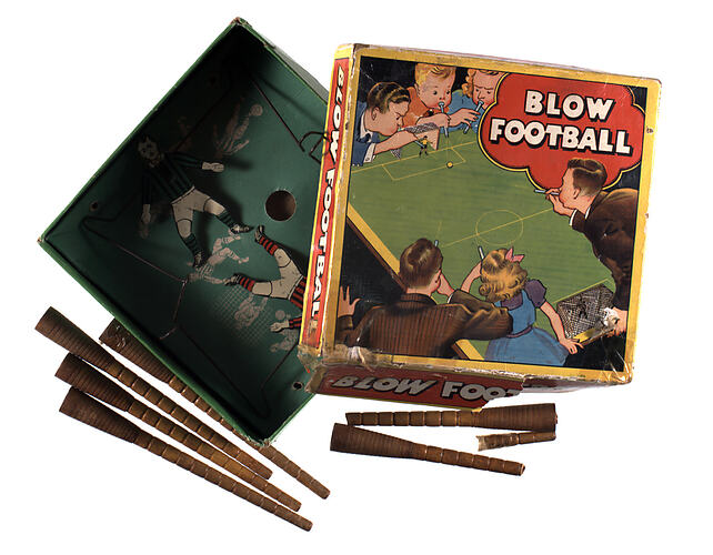 Game box with parts scattered around.