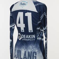 Back of women's AFLW guernsey with Indigenous pattern in navy and white. Lined and dotted design. Number 41.