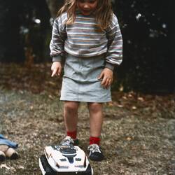 Digital Photograph - Child Playing with the BigTrak, Geelong Grammar, Toorak Campus, 1982