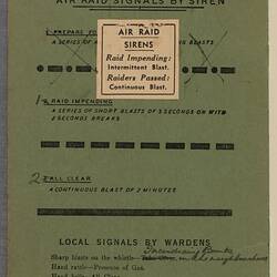 Inside of front green cover of pamphlet. Black printed text. White label.