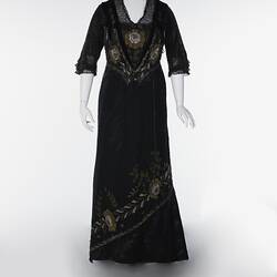 Black, silk satin dress, beading, floral embroidery.