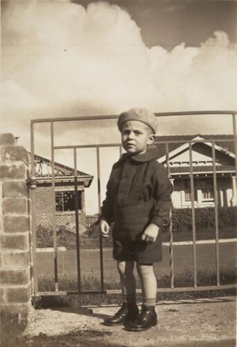 Digital Photograph - Boy in Cap by Front Gate, Strathmore, 1947