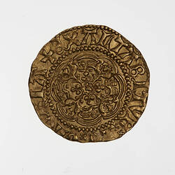 Coin, round, a floriated cross, in each angle a lion passant; text around.