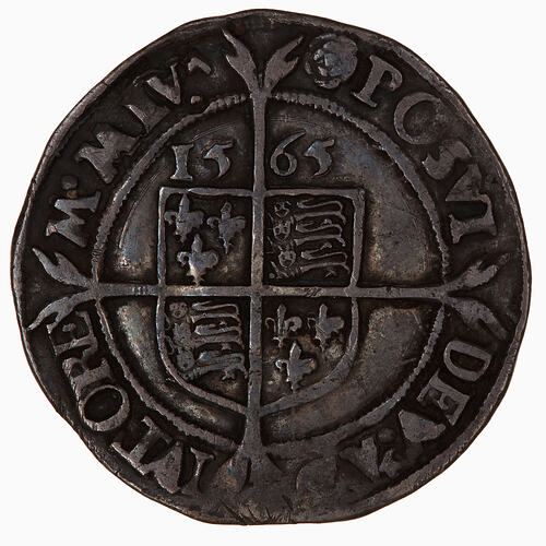 Coin, round, at centre within a beaded circle and over long cross fourchee, a quartered shield.