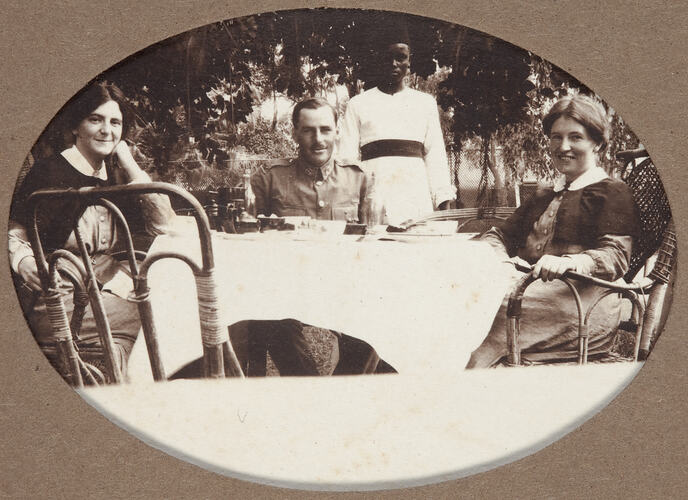 Digital Image - World War I, Two Women & a Man with Servant at Table, Egypt, 1915-1917